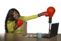 Happy beautiful black afro American woman in boxing gloves smiling cheerful working at office computer desk posing as successful e