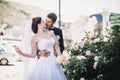 Happy and beautiful bride and groom kissing Royalty Free Stock Photo