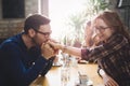 Happy couple flirting and dating in restaurant Royalty Free Stock Photo