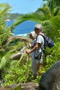 Happy elderly couple in tropical forest Royalty Free Stock Photo