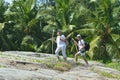 Portrait of happy elderly couple in tropical forest Royalty Free Stock Photo