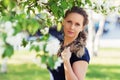 Happy beautiful fashion woman in a spring garden Royalty Free Stock Photo