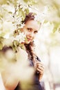 Happy beautiful fashion woman in a spring garden Royalty Free Stock Photo