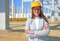 Happy beautiful female architect on construction site Royalty Free Stock Photo