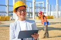 Female architect with tablet and construction engineer Royalty Free Stock Photo