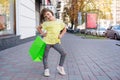 The happy beautiful girl with a bag for purchases Royalty Free Stock Photo