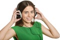 Happy beautiful girl listening to music in headphones Royalty Free Stock Photo