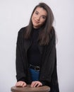 Happy beautiful girl model in black dress posing in studio isolated on white background,Teen girl in in blue jeans and black boots