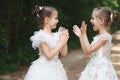 Happy beautiful girls with white wedding dresses Royalty Free Stock Photo