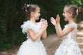 Happy beautiful girls with white wedding dresses