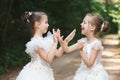 Happy beautiful girls with white wedding dresses Royalty Free Stock Photo