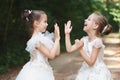 Happy beautiful girls with white wedding dresses Royalty Free Stock Photo