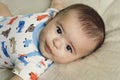 Happy beautiful hispanic baby boy relaxing. Royalty Free Stock Photo