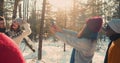 Happy beautiful romantic couple smile posing at photoshoot together at magnificent snowy winter forest slow motion.