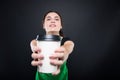 Happy beautiful seller giving fresh coffee Royalty Free Stock Photo