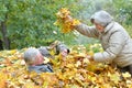 Portrait of happy senior couple in autumn park Royalty Free Stock Photo