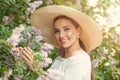 Happy beautiful woman with flowers outdoors Royalty Free Stock Photo