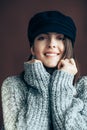 Happy beautiful woman in warm wool sweater