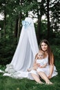 Happy beautiful woman, young mother playing with her adorable baby son, cute little boy, enjoying together a sunny warm Royalty Free Stock Photo