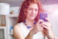 Happy beautiful young businesswoman using smart phone smiling Royalty Free Stock Photo