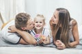 Happy beautiful young family father, mother and daughter smilin Royalty Free Stock Photo