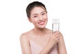 Happy beautiful young vietnamese woman drinking water. Royalty Free Stock Photo