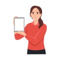 Happy beautiful young woman holding or showing a blank clipboard and showing hand to copy space side away Royalty Free Stock Photo