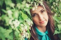 Happy beautiful young woman in spring blossom park. Royalty Free Stock Photo