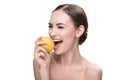 Happy beautiful youthful woman enjoying fresh fruits and wellness Royalty Free Stock Photo