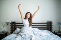 Happy beauty morning of beauty girl streching in bed Royalty Free Stock Photo