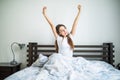 Happy beauty morning of beauty girl streching in bed Royalty Free Stock Photo