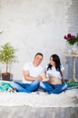 Happy beloved man and pregnant woman at home Royalty Free Stock Photo