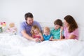 Happy big family in a bed Royalty Free Stock Photo