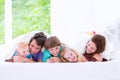 Happy big family in a bed Royalty Free Stock Photo