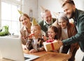 Happy big family celebrating birthday online via video call on laptop while staying at home Royalty Free Stock Photo