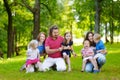 Happy big family having fun in summer park Royalty Free Stock Photo