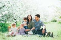 Happy big family mom dad and children daughters and son having fun outdoor in park smiling and laughing. Kids Childhood Lifestyle Royalty Free Stock Photo