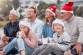 Happy, big family and relax for Christmas holiday, bonding and quality time together in the outdoors. Parents Royalty Free Stock Photo