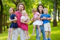 Happy big family of six at summer park Royalty Free Stock Photo