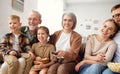 Happy big family watching TV and eating popcorn Royalty Free Stock Photo