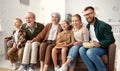 Happy big family watching TV and eating popcorn Royalty Free Stock Photo