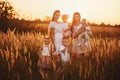 happy big gay family on sunset. Two young beautiful mothers and four little children are having fun together outdoors on Royalty Free Stock Photo