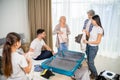 Happy big multigenerational family preparing luggage for travel Royalty Free Stock Photo