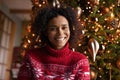Happy biracial woman talk on video call on winter holidays Royalty Free Stock Photo