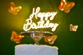 Happy Birthday and Butterfly on green Background. Happy Birthday Wishes Card. Royalty Free Stock Photo