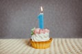 Happy 1 birthday cake and blue number one candle Royalty Free Stock Photo