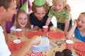 Happy birthday, cake decoration and celebration by table, party and fun in home with wellness. Father, children and Royalty Free Stock Photo