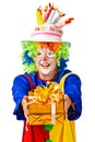 Happy birthday clown with gift box.