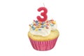 Happy birthday cup cake with star sprinkles and number 3 pink ca Royalty Free Stock Photo