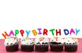 Happy Birthday Cupcakes with candles Royalty Free Stock Photo